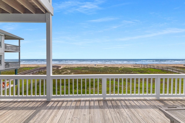 22915 Gulf Dr, Galveston, TX 77554 - wooden terrace with a water view and a view of the beach