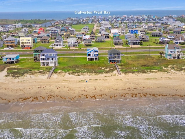 22915 Gulf Dr, Galveston, TX 77554 - drone / aerial view featuring a residential view and a water view