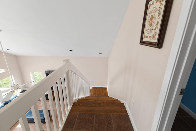 22915 Gulf Dr, Galveston, TX 77554 - staircase featuring baseboards and wood finished floors