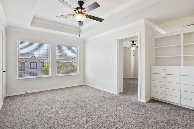 13217 Green Hills Dr, Houston, TX 77077 - unfurnished bedroom featuring crown molding, carpet floors, a tray ceiling, a ceiling fan, and baseboards