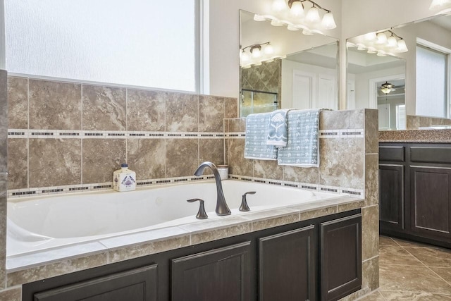 13217 Green Hills Dr, Houston, TX 77077 - full bathroom with a bath, vanity, and a ceiling fan