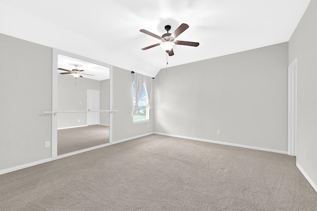 3411 Heather Garden Trl, Richmond, TX 77406 - carpeted spare room featuring a ceiling fan, baseboards, and vaulted ceiling