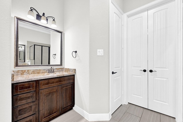 3411 Heather Garden Trl, Richmond, TX 77406 - bathroom featuring vanity and baseboards
