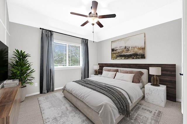3411 Heather Garden Trl, Richmond, TX 77406 - bedroom with light carpet, baseboards, and a ceiling fan