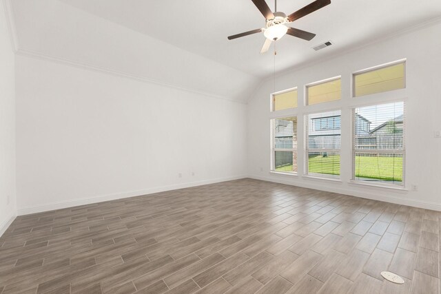 6518 Fairway Glen Ln, Katy, TX 77493 - spare room with wood finished floors, baseboards, visible vents, a ceiling fan, and lofted ceiling