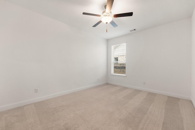 6518 Fairway Glen Ln, Katy, TX 77493 - unfurnished room featuring visible vents, ceiling fan, light colored carpet, and baseboards