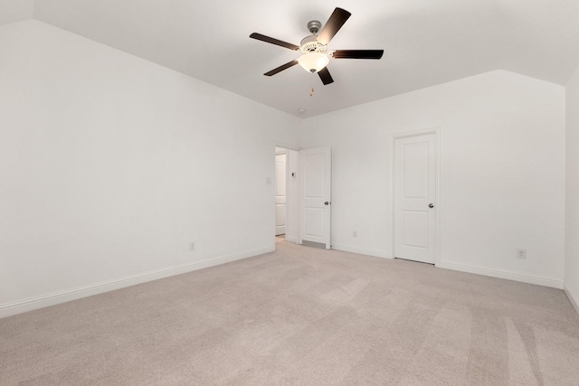 6518 Fairway Glen Ln, Katy, TX 77493 - unfurnished bedroom with baseboards, ceiling fan, light colored carpet, and lofted ceiling