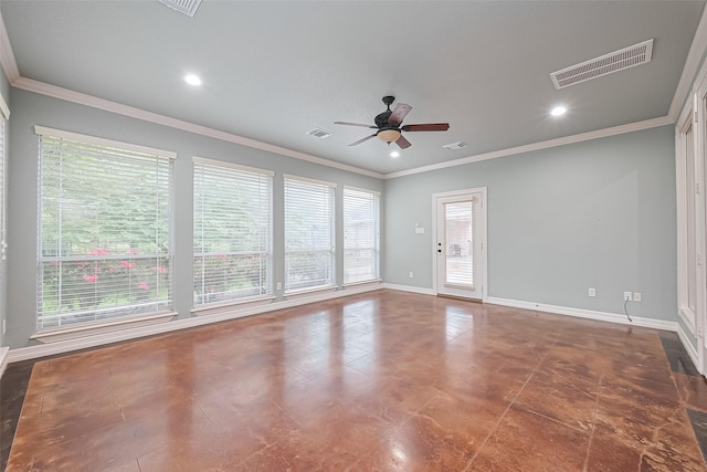 spare room featuring crown molding, ceiling fan, baseboards, and visible vents