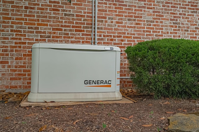 details with brick siding and a power unit