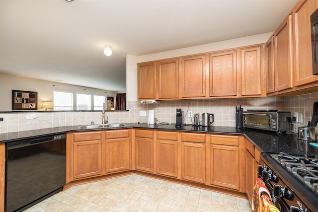 22110 Orchard Dale Dr, Spring, TX 77389 - kitchen with tasteful backsplash, dishwasher, a sink, and a toaster