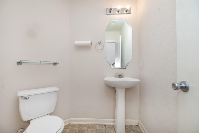 22110 Orchard Dale Dr, Spring, TX 77389 - half bathroom featuring baseboards and toilet