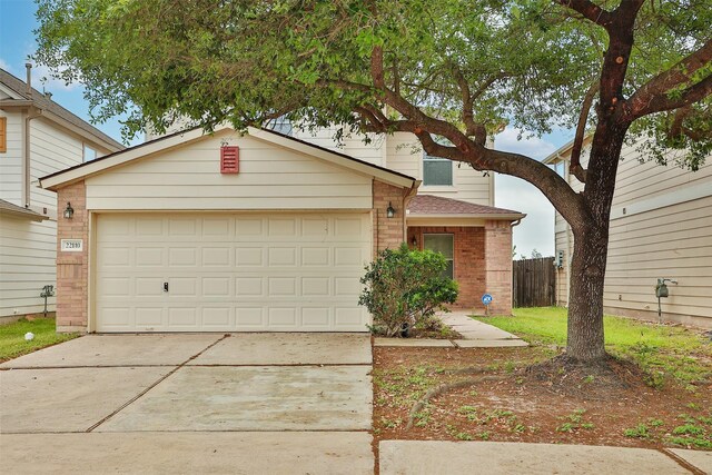 22110 Orchard Dale Dr, Spring, TX 77389 - traditional-style house featuring driveway, brick siding, a garage, fence, and a shingled roof