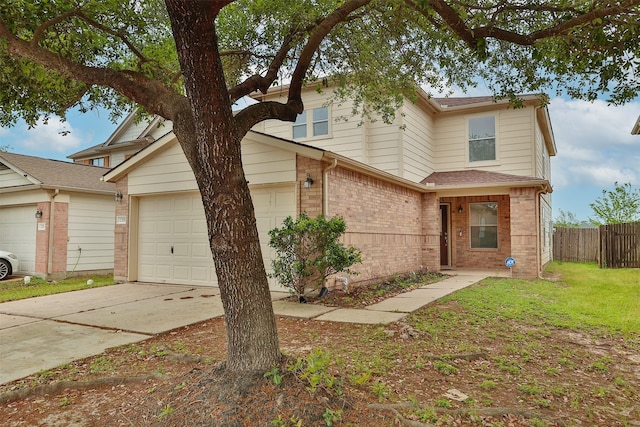 22110 Orchard Dale Dr, Spring, TX 77389 - view of front of home with concrete driveway, a front lawn, brick siding, a garage, and fence