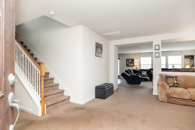 22110 Orchard Dale Dr, Spring, TX 77389 - carpeted living area with baseboards and stairway