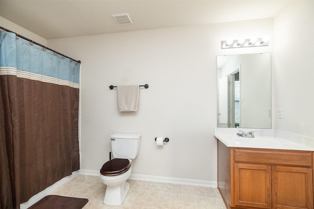 22110 Orchard Dale Dr, Spring, TX 77389 - bathroom featuring toilet, vanity, baseboards, and visible vents