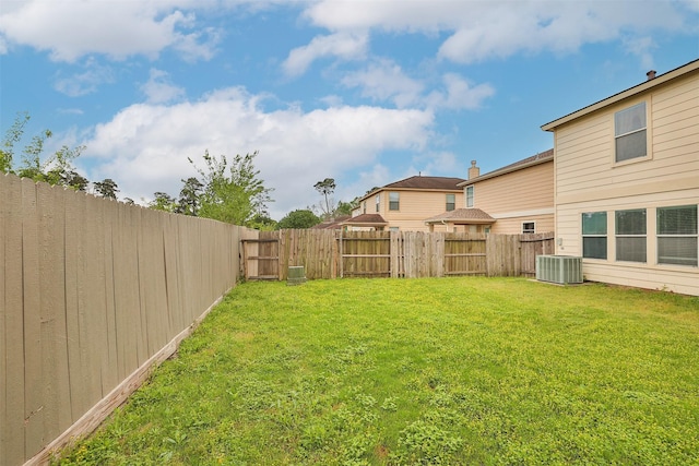 22110 Orchard Dale Dr, Spring, TX 77389 - view of yard featuring central AC and a fenced backyard