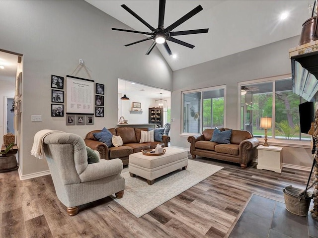 3065 S Fm 1194, Lufkin, TX 75904 - living area featuring baseboards, high vaulted ceiling, ceiling fan, and wood finished floors
