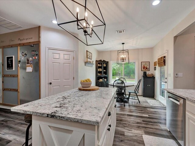 3065 S Fm 1194, Lufkin, TX 75904 - kitchen with a chandelier, white cabinetry, dishwasher, dark wood-style floors, and visible vents