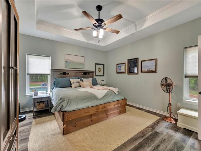 3065 S Fm 1194, Lufkin, TX 75904 - bedroom with baseboards, wood finished floors, ornamental molding, and a raised ceiling