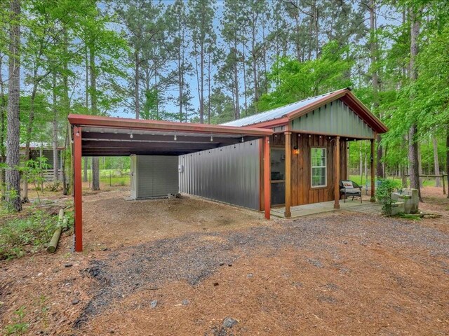 3065 S Fm 1194, Lufkin, TX 75904 - view of outdoor structure with an outbuilding and dirt driveway