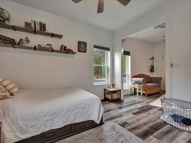 3065 S Fm 1194, Lufkin, TX 75904 - bedroom featuring wood finished floors and ceiling fan