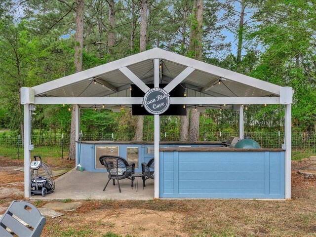 3065 S Fm 1194, Lufkin, TX 75904 - view of patio / terrace with outdoor dry bar, area for grilling, a gazebo, and fence