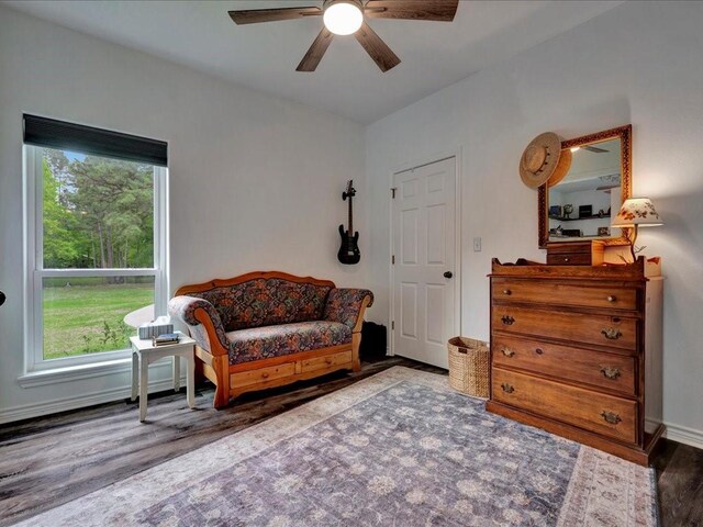 3065 S Fm 1194, Lufkin, TX 75904 - living area featuring wood finished floors, baseboards, and ceiling fan