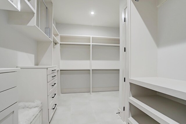 spacious closet featuring light flooring