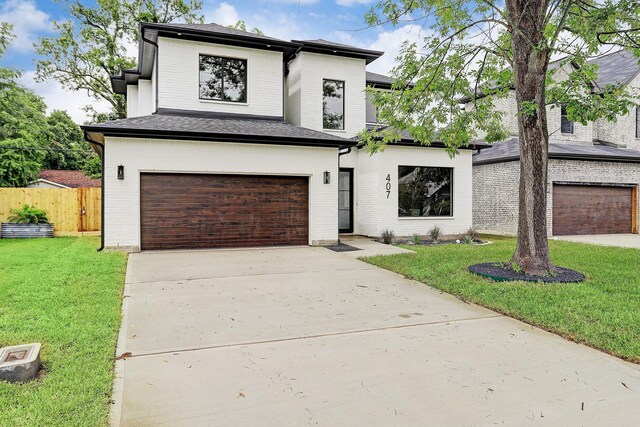 view of front facade with an attached garage and concrete driveway