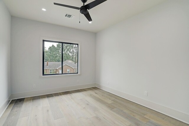 unfurnished room with ceiling fan, light wood-style floors, recessed lighting, and baseboards