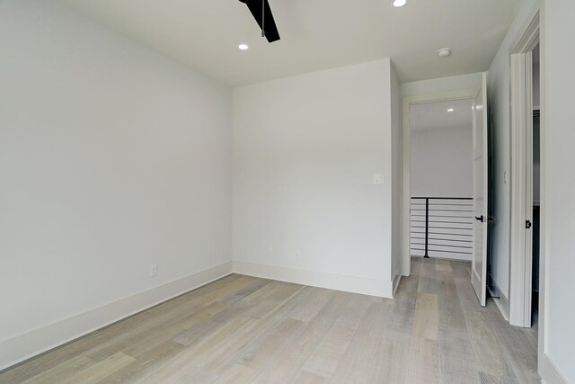 unfurnished bedroom featuring light wood-type flooring, recessed lighting, baseboards, and a ceiling fan