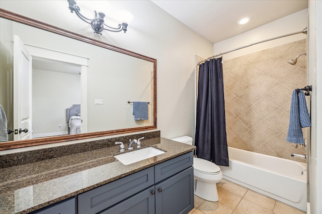 full bath with toilet, vanity, recessed lighting, shower / bath combo, and tile patterned flooring