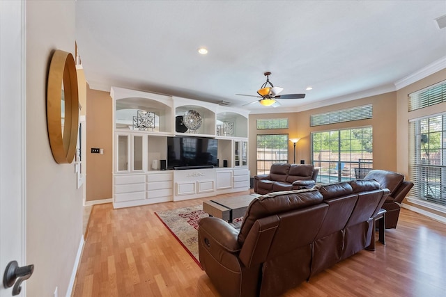 5206 Summer Snow Dr, Houston, TX 77041 - living area with light wood finished floors, ornamental molding, ceiling fan, baseboards, and recessed lighting