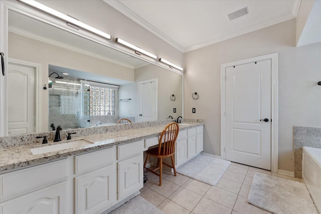 5206 Summer Snow Dr, Houston, TX 77041 - full bath with a stall shower, tile patterned flooring, double vanity, crown molding, and a garden tub