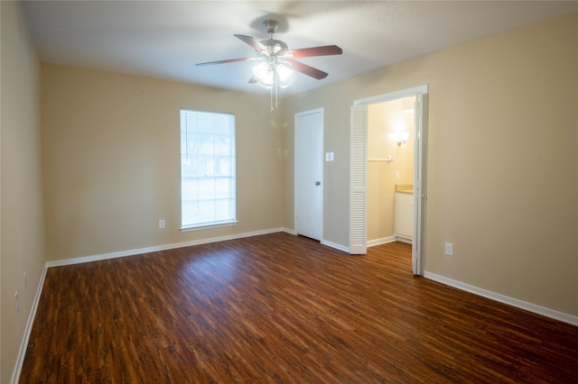 1910 Cobble Creek Dr, Houston, TX 77073 - spare room featuring baseboards, a ceiling fan, and dark wood finished floors