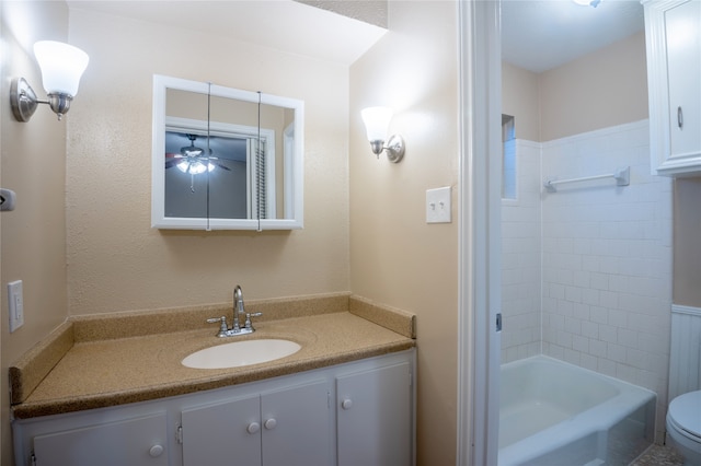 1910 Cobble Creek Dr, Houston, TX 77073 - bathroom with bathtub / shower combination, toilet, ceiling fan, and vanity