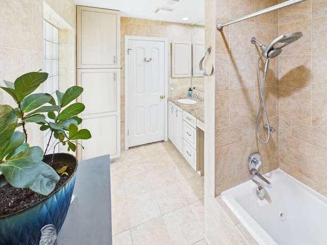 1310 Golden Bear Ln, Kingwood, TX 77339 - bathroom featuring tile patterned flooring, vanity, and tiled shower / bath