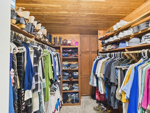 1310 Golden Bear Ln, Kingwood, TX 77339 - walk in closet featuring carpet floors