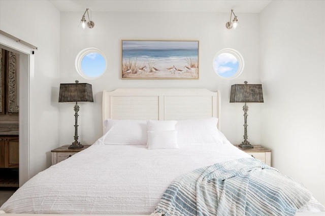 986 Bolivar Dunes Blvd, Gilchrist, TX 77617 - bedroom featuring a barn door