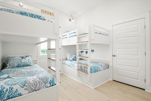 986 Bolivar Dunes Blvd, Gilchrist, TX 77617 - bedroom featuring wood finished floors
