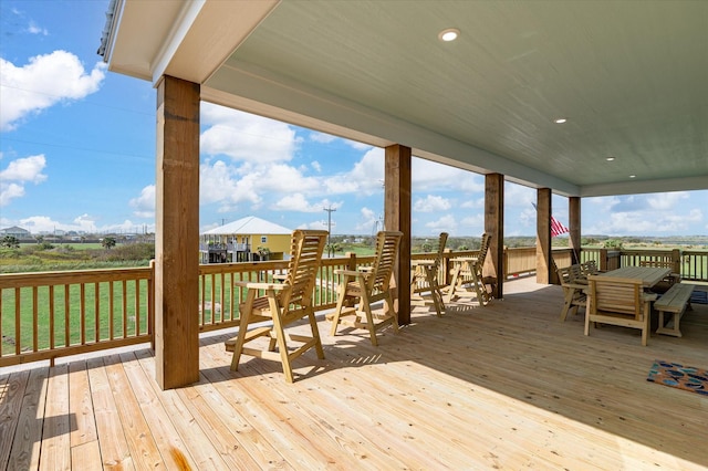 986 Bolivar Dunes Blvd, Gilchrist, TX 77617 - deck with outdoor dining area