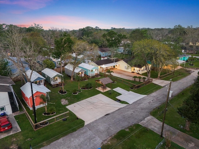 aerial view at dusk with a residential view