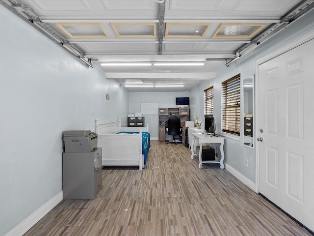 garage featuring baseboards
