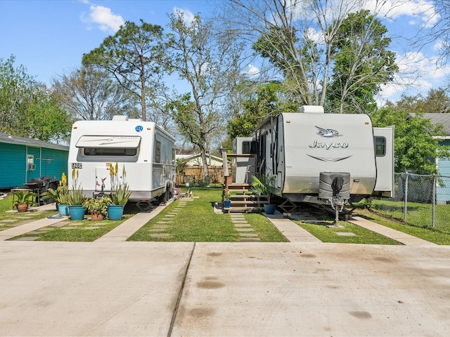 view of yard featuring fence