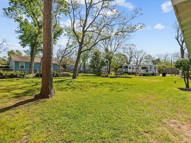 view of yard with fence