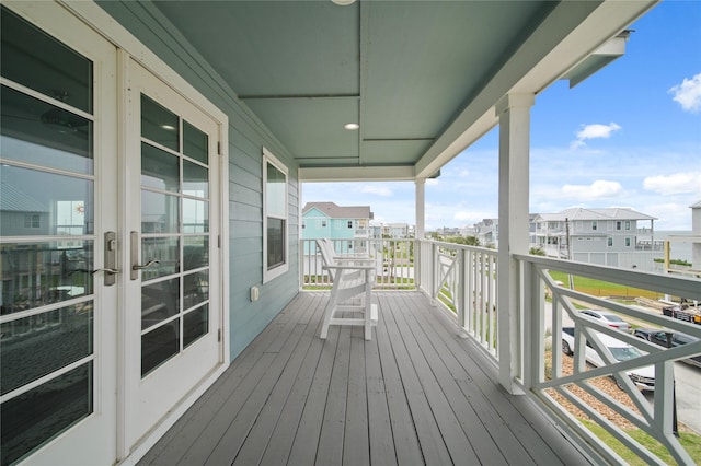 26711 Bay Water Dr, Galveston, TX 77554 - wooden deck with a residential view