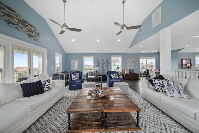 26711 Bay Water Dr, Galveston, TX 77554 - living room featuring high vaulted ceiling, visible vents, and a ceiling fan