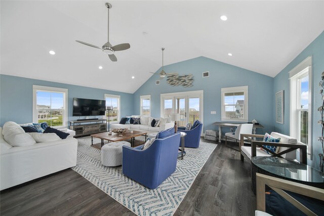 26711 Bay Water Dr, Galveston, TX 77554 - living room featuring wood finished floors, a ceiling fan, and plenty of natural light