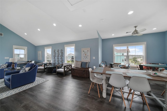 26711 Bay Water Dr, Galveston, TX 77554 - dining room featuring wood finished floors, visible vents, lofted ceiling, and plenty of natural light