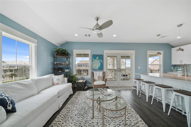26711 Bay Water Dr, Galveston, TX 77554 - living room featuring visible vents, a healthy amount of sunlight, a ceiling fan, and lofted ceiling